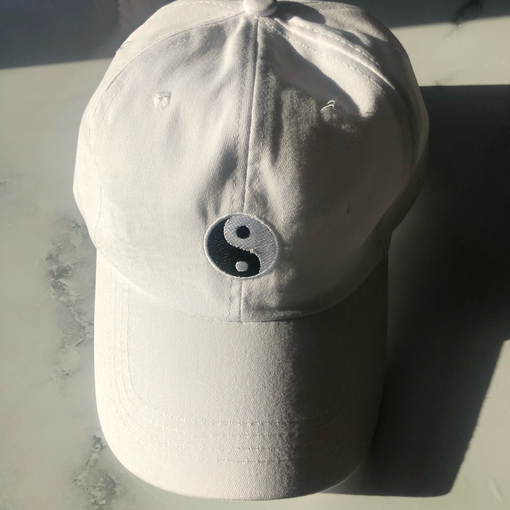 Brand New with Tag ying and yang basketball hat. Urban Outfitters